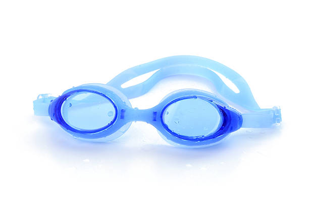 istock Blue swimming goggles with water drops on white background 525810664