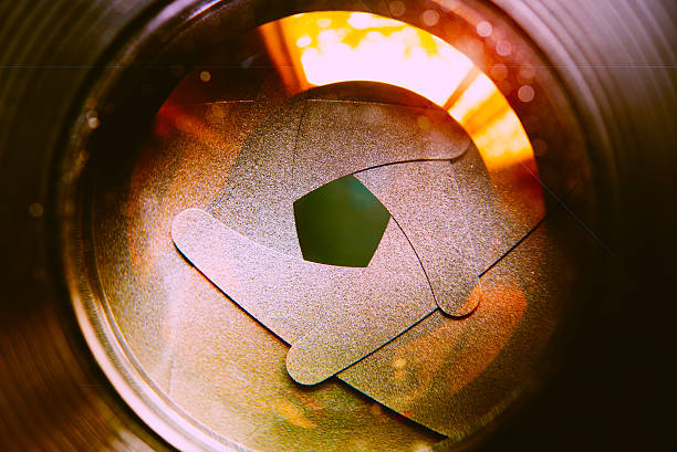 istock The diaphragm of lens aperture with flare. Selective focus with 525812136