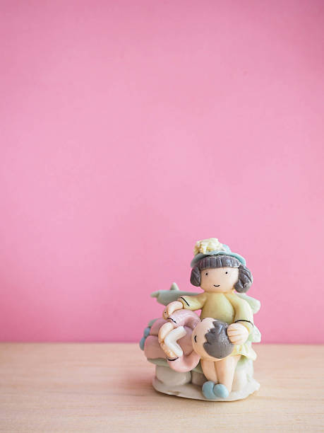Couple doll and pink background
