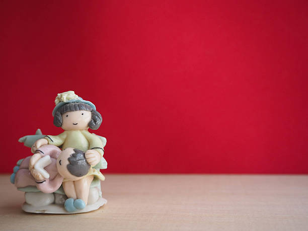 istock Couple doll and red background 525813030