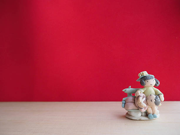 istock Couple doll and red background 525813046