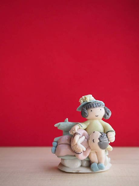 istock Couple doll and red background 525813062