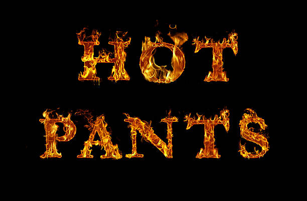 istock HOT PANTS written with burning letters in flame 525813556