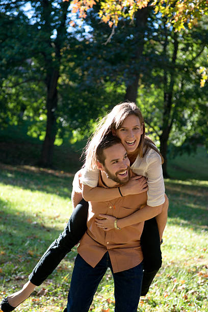 istock Young couple having fun in the park 525830089