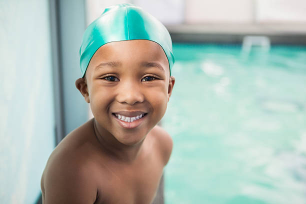 istock Cute little boy smiling at the pool 525830945