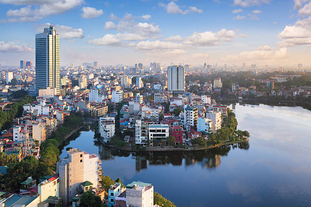 View over Hanoi, Vietnam View over the city of Hanoi, Vietnam, with Trúc Bạch Lake in the foreground. vietnam stock pictures, royalty-free photos & images