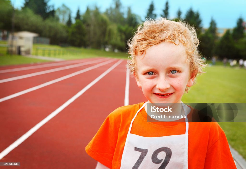 Little athlete at running track See more of this boy:  http://www.oc-photo.net/FTP/icons/nurvic.jpg Activity Stock Photo