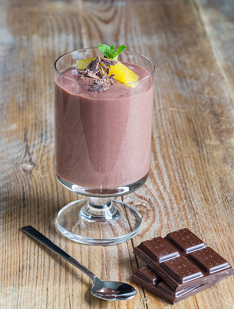 istock Chocolate pudding dessert with orange and grated chocolate 525834969