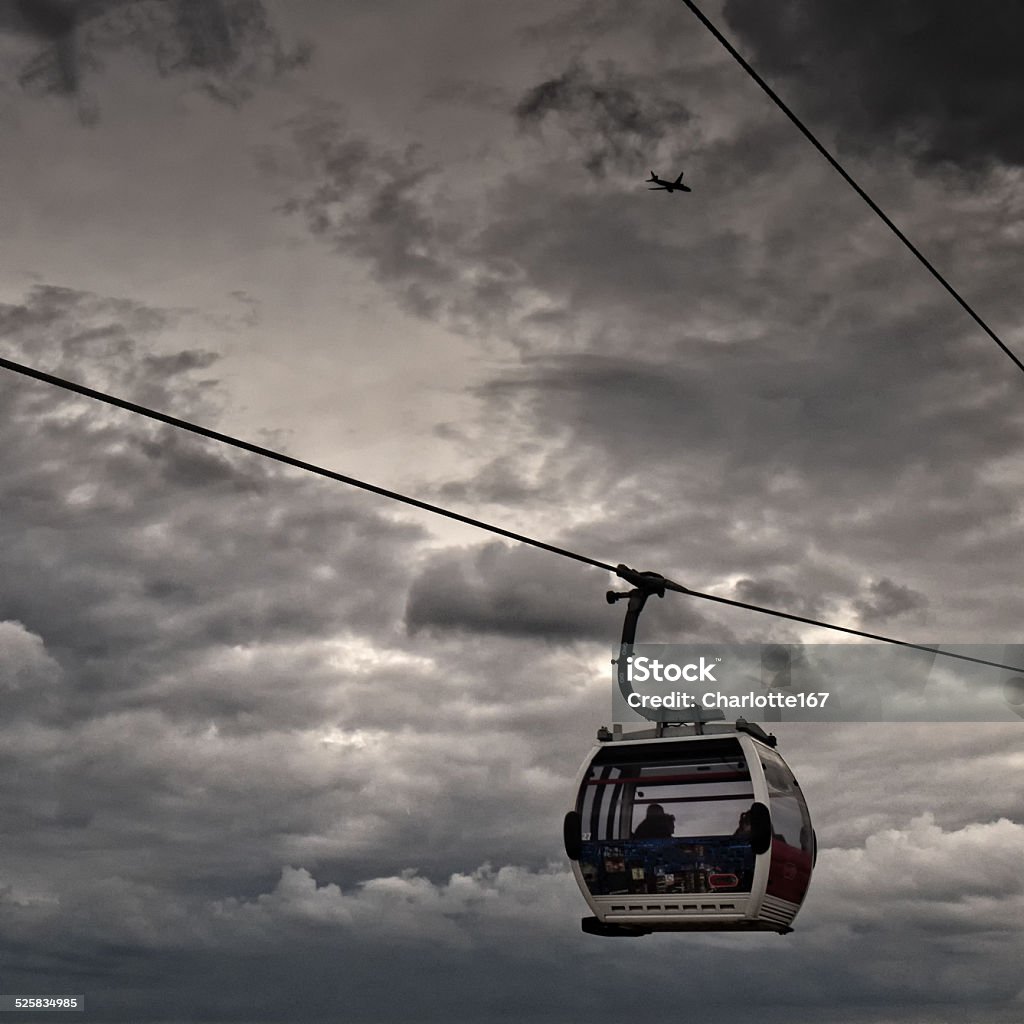 Cable Car Travel In flight in a cable car across London's Docklands Airplane Stock Photo