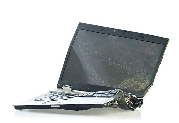 Broken laptop computer stock photo