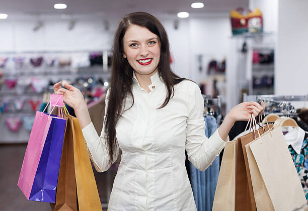 istock Young womat at the clothes store 525835179