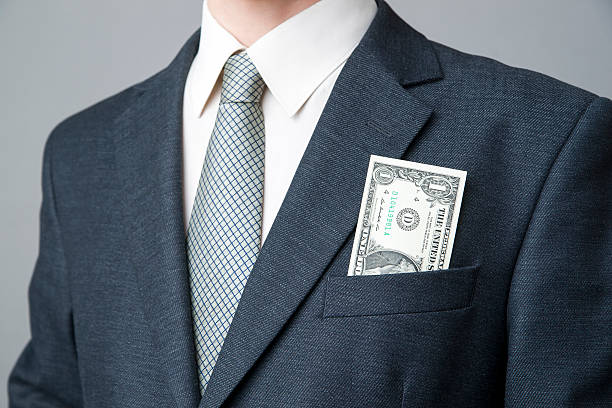 istock Businessman with money in studio 525857929