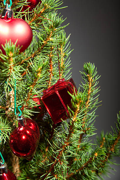 istock Christmas and New Year, spruce with decorations and shiny highlights 525859203