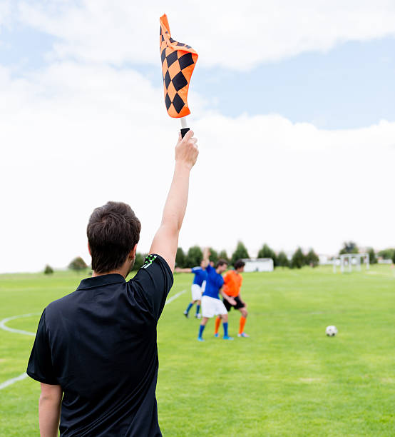 istock Football referee pointing a fault 525860023