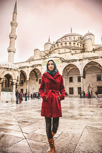 istock Beautiful woman wearing headscarf 525861037