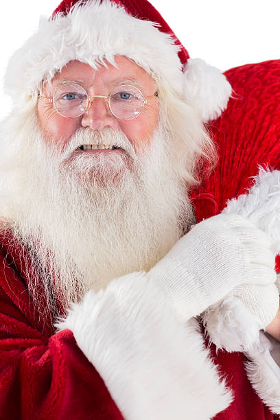 istock Jolly Santa carries his sack 525861681