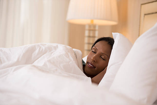 istock Sleeping woman at bedroom. 525864057