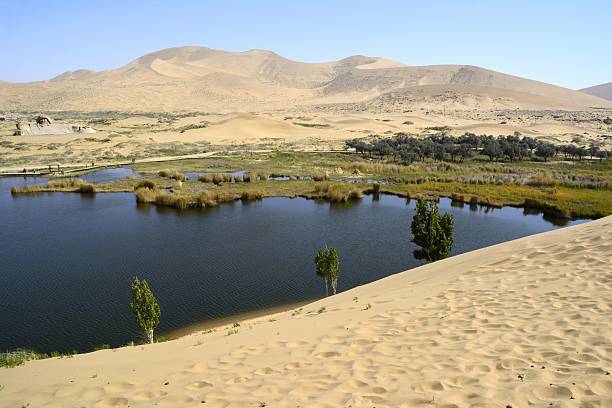 istock Lake in Badain Jaran desert, Inner Mongolia, China 525874558