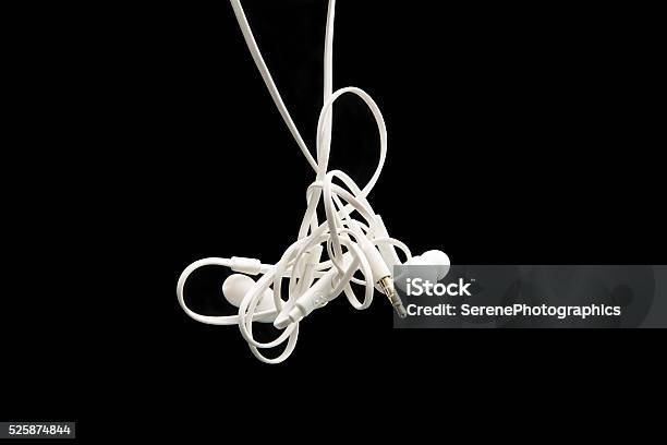 Tangled Eareuds Stock Photo - Download Image Now - Headphones, Tangled, Tied Up