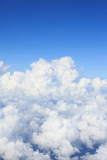 istock white cumulus clould and cloudscape on blue sky horizon background 525876276
