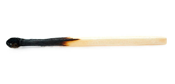 istock Wooden match isolated over the white background 525877658