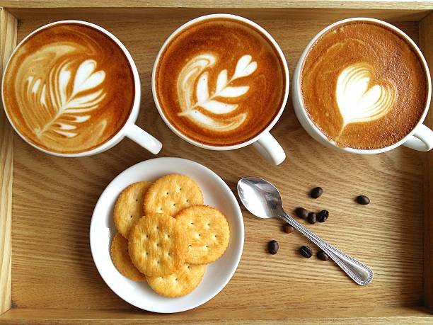 istock Latte art coffee so delicious on wood background 525878098
