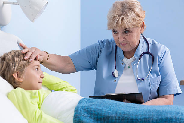 istock Ill boy having high fever 525879117