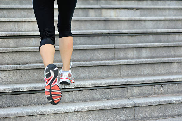 istock Runner athlete running on city stairs. 525879145