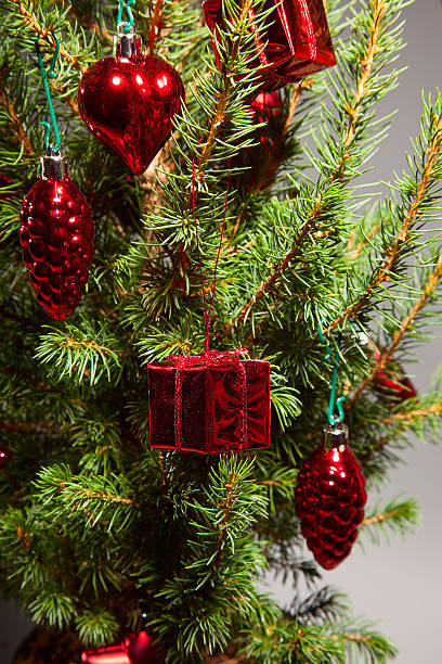 istock Christmas and New Year, spruce with decorations and shiny highlights 525881237