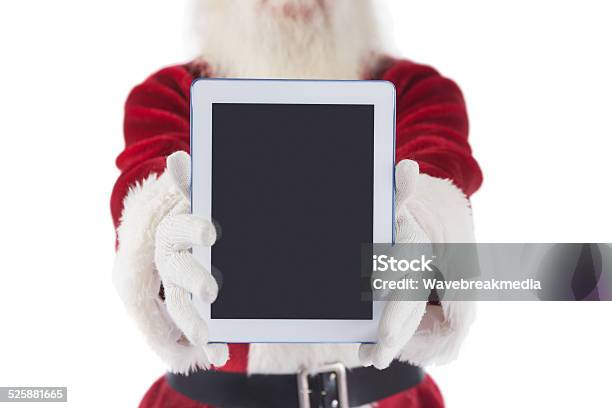 Santa Presents A Tablet Pc Stock Photo - Download Image Now - Christmas, Digital Tablet, 80-89 Years