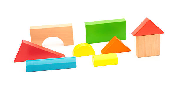 istock different color and shape wooden toy blocks on white background 525881842