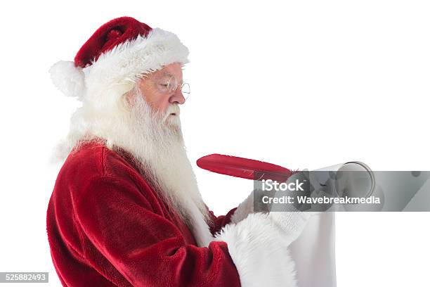 Father Christmas Writes A List Stock Photo - Download Image Now - 80-89 Years, Active Seniors, Adult