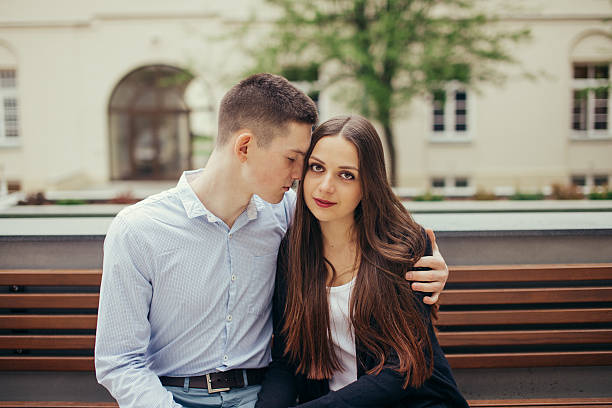 istock Lovely couple sitting in the park background 525882710