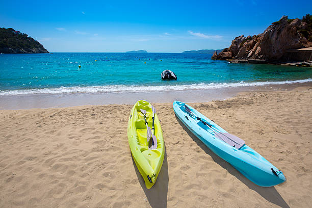 istock Ibiza cala Sant Vicent beach with Kayaks san Juan 525882803