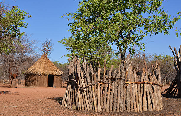 istock Corral and mud hut, Himba village, Namibia 525883379