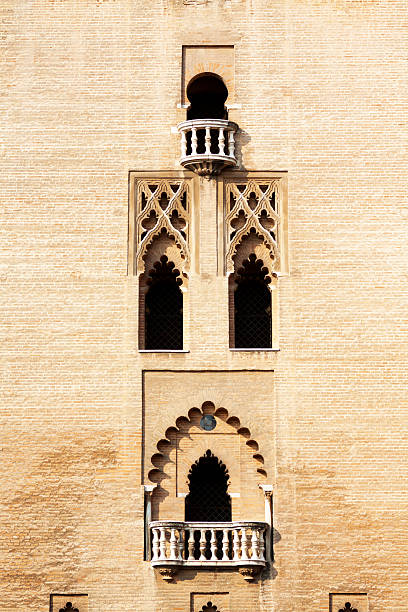 Windows and balcony of Giralda, old arabic tower of cathedral Santa Maria de la Sede in Sevilla