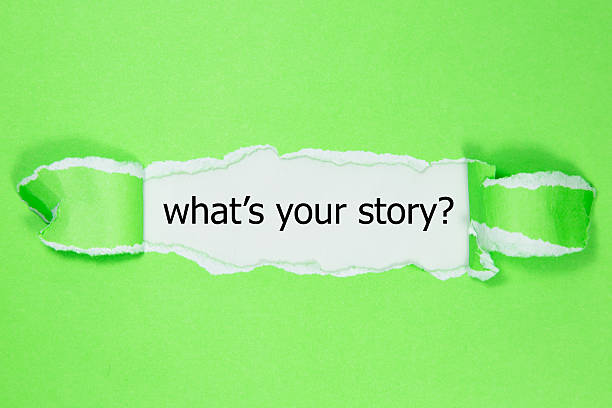 istock Text 'What's your story?' appears under the torn paper. 525883528