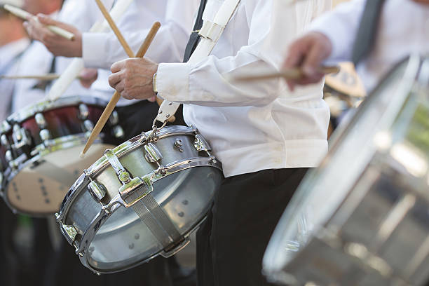 istock Drummers playing snare drums in parade 525883609