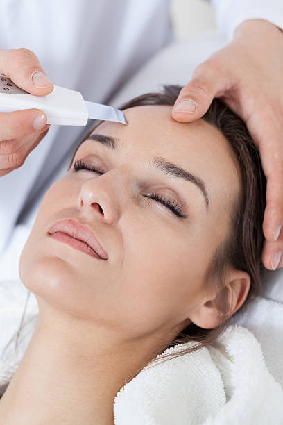 istock Relaxed woman during cavitation peeling 525883621