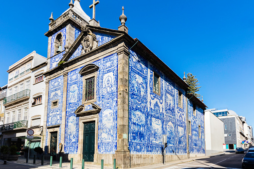 This 18th century chapel halfway between the pedestrian Santa Catarina Street with this tiled decoration all over its exterior walls done in the early 20th century by painter, ceramist Eduardo Leite.