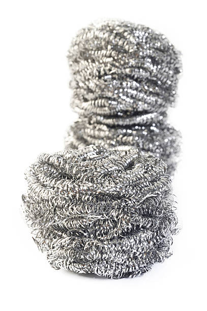 istock stainless steel scourer on white background 525884004