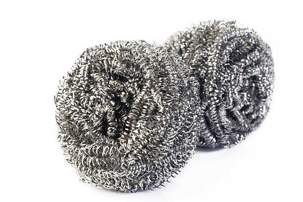istock stainless steel scourer on white background 525884202