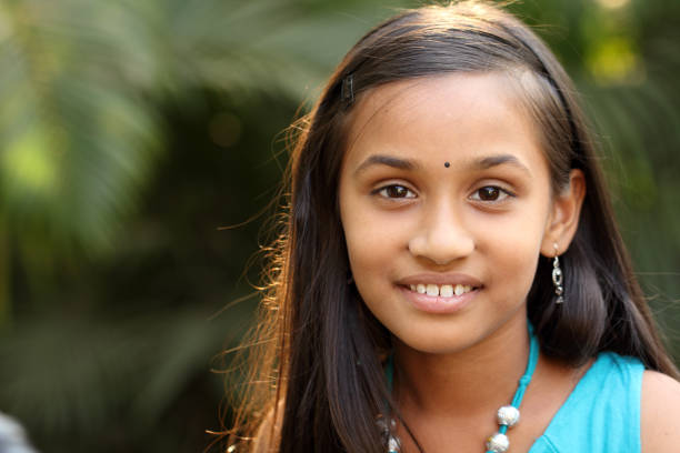 istock cute Indian girl portrait 525884400