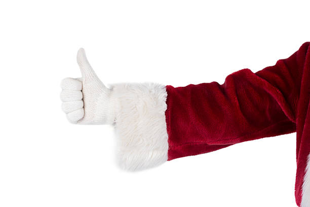 istock Father Christmas gives a thumb up 525884473