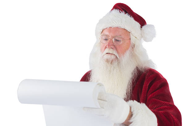 istock Santa Claus reads a list 525884759