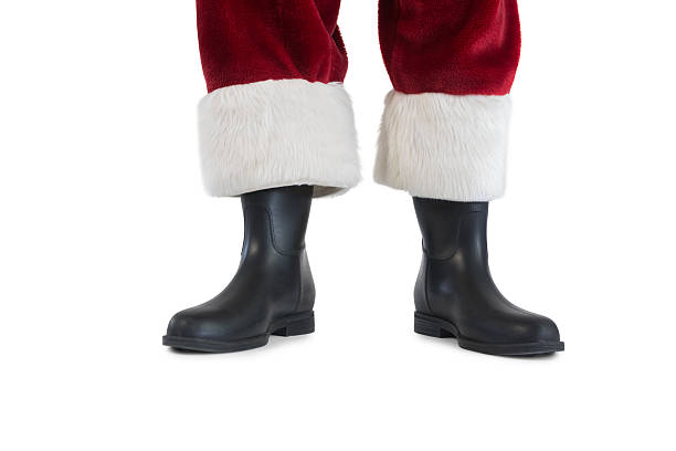 istock Father Christmas boots and legs 525885015