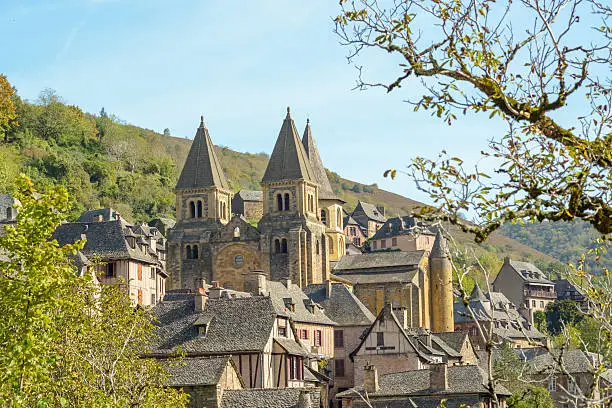 This is an image of the medieval pilgrimage town of Conques in France.