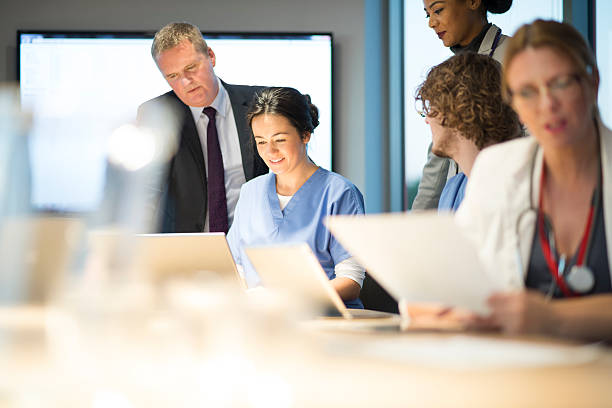 istock medical sales team assist 525885821