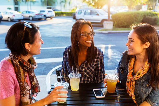 istock Best Friends Stop to Have a Drink Outside 525885873
