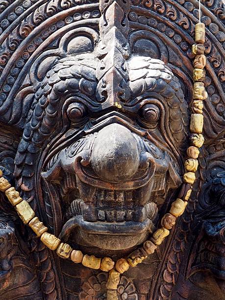 Scary king of Naga ' s face with ivory beaded